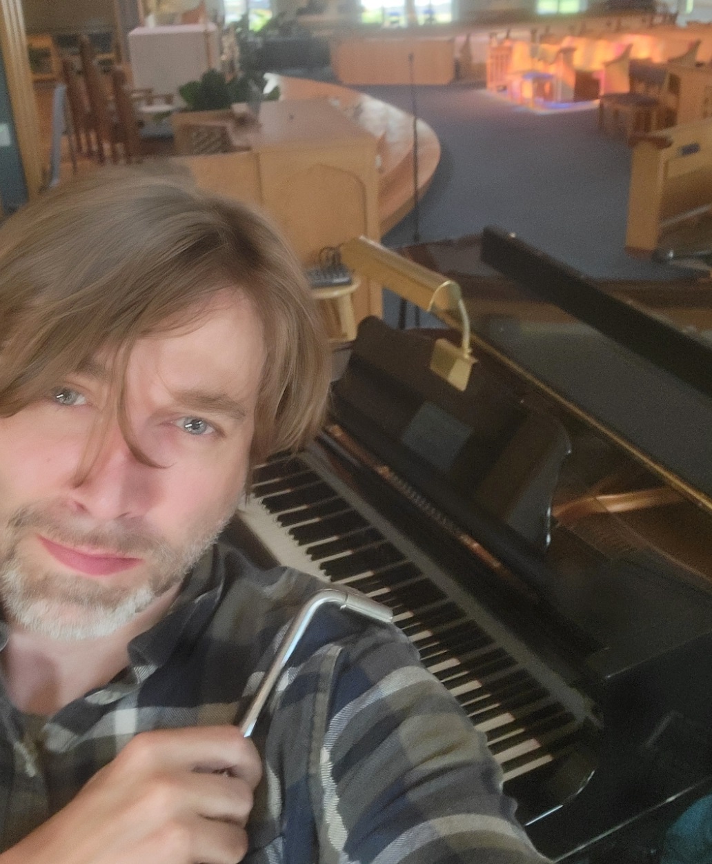 Michael Keating tuning a piano